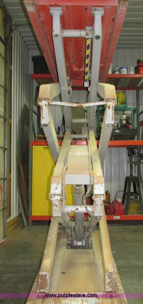 image for item H1030 1999 Skyjack SJIII 3220 scissor lift