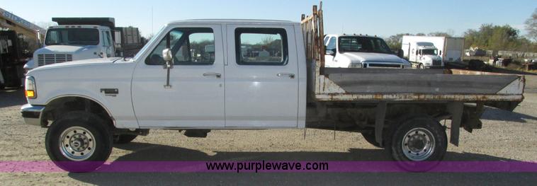 image for item H1032 1996 Ford F350 XLT Crew Cab flat dump bed truck