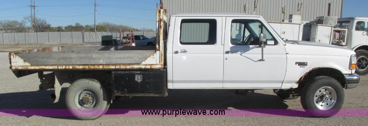 image for item H1032 1996 Ford F350 XLT Crew Cab flat dump bed truck