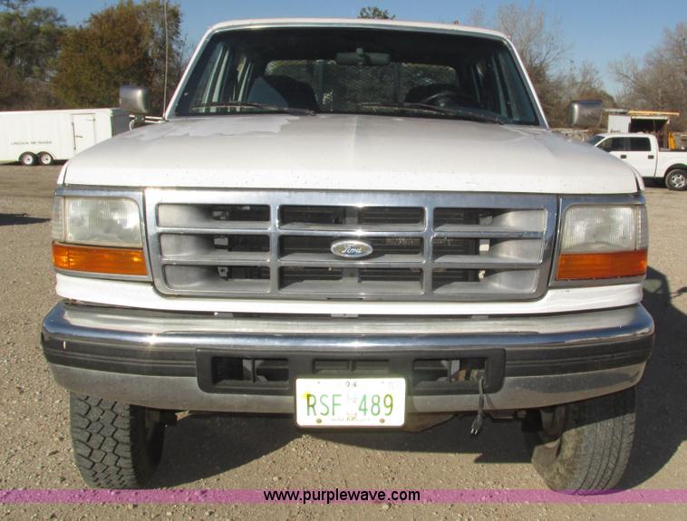 image for item H1032 1996 Ford F350 XLT Crew Cab flat dump bed truck