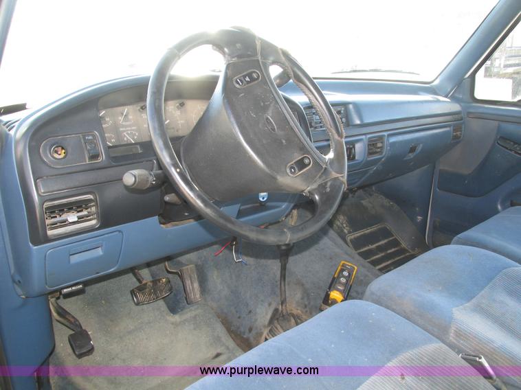 image for item H1032 1996 Ford F350 XLT Crew Cab flat dump bed truck