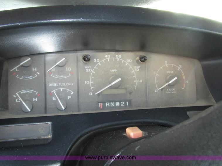 image for item H1032 1996 Ford F350 XLT Crew Cab flat dump bed truck