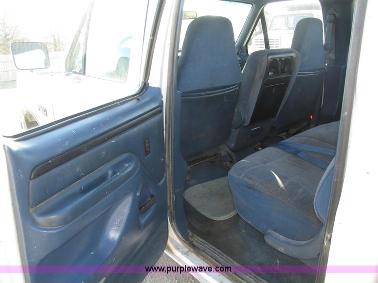 image for item H1032 1996 Ford F350 XLT Crew Cab flat dump bed truck