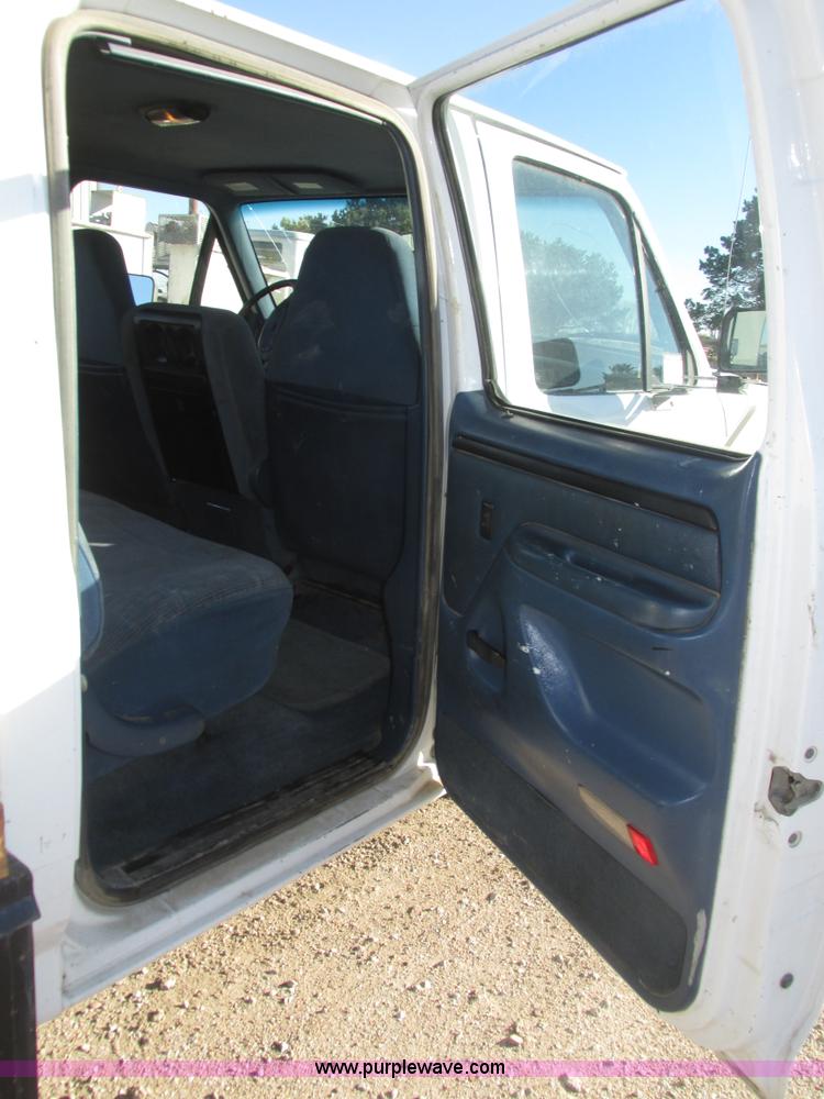 image for item H1032 1996 Ford F350 XLT Crew Cab flat dump bed truck