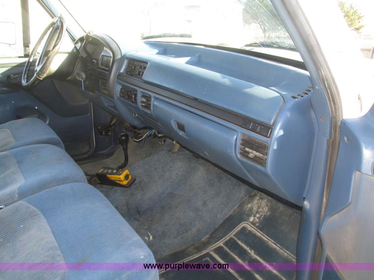 image for item H1032 1996 Ford F350 XLT Crew Cab flat dump bed truck