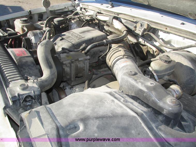 image for item H1032 1996 Ford F350 XLT Crew Cab flat dump bed truck