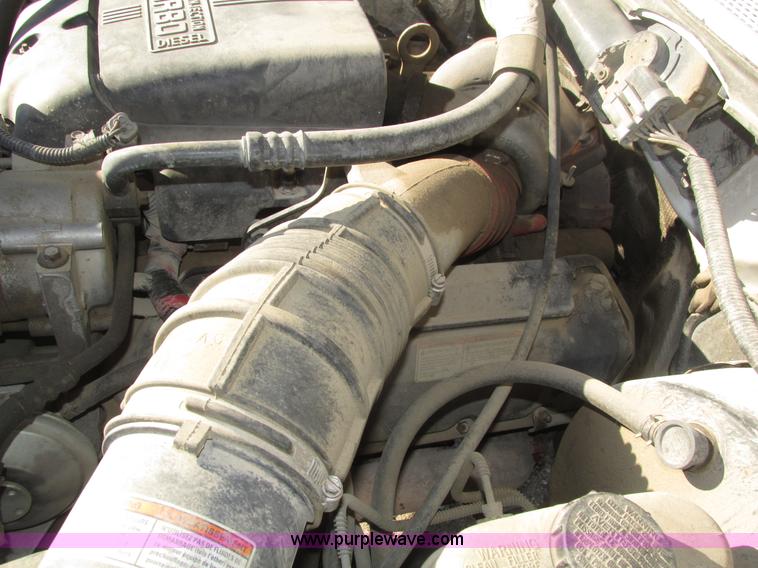 image for item H1032 1996 Ford F350 XLT Crew Cab flat dump bed truck