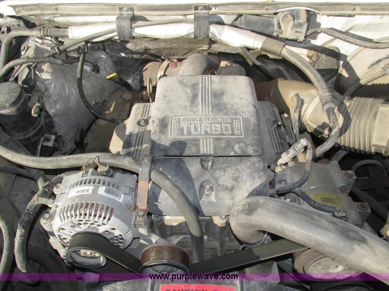 image for item H1032 1996 Ford F350 XLT Crew Cab flat dump bed truck