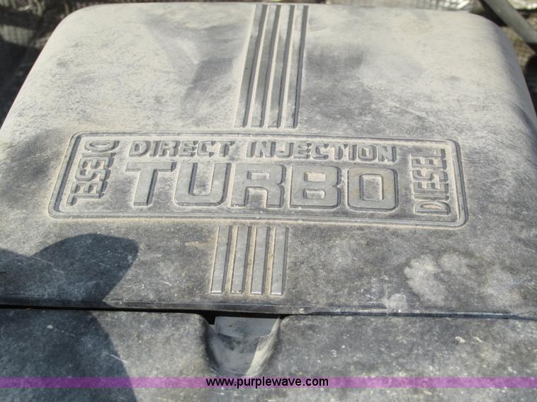 image for item H1032 1996 Ford F350 XLT Crew Cab flat dump bed truck