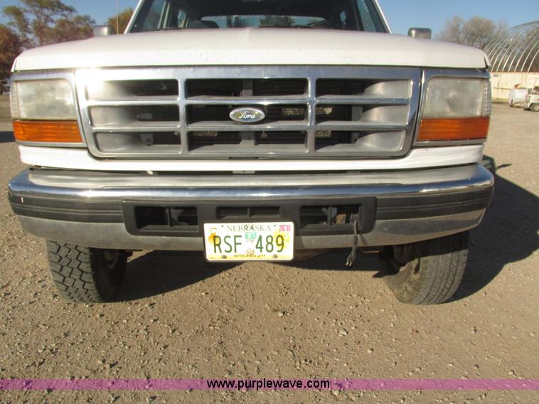 image for item H1032 1996 Ford F350 XLT Crew Cab flat dump bed truck