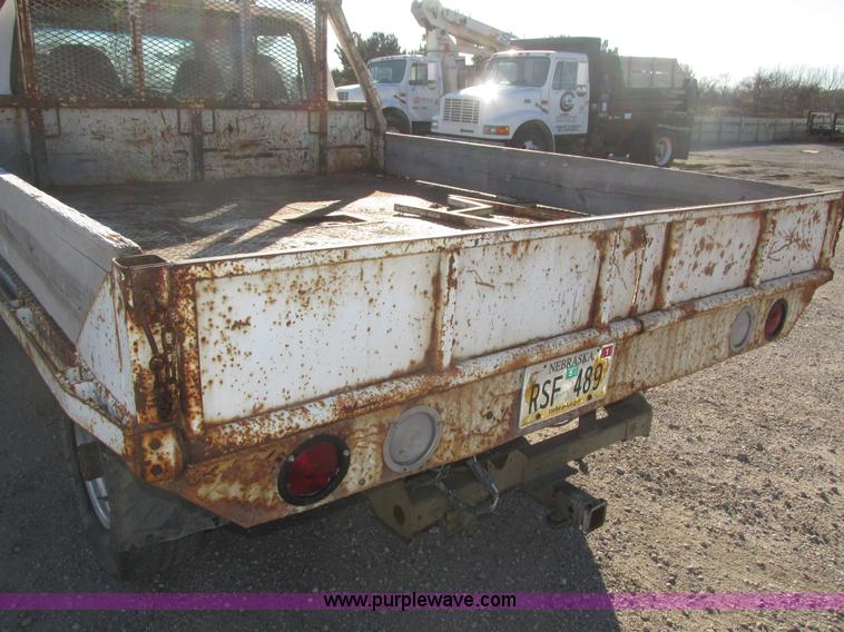 image for item H1032 1996 Ford F350 XLT Crew Cab flat dump bed truck