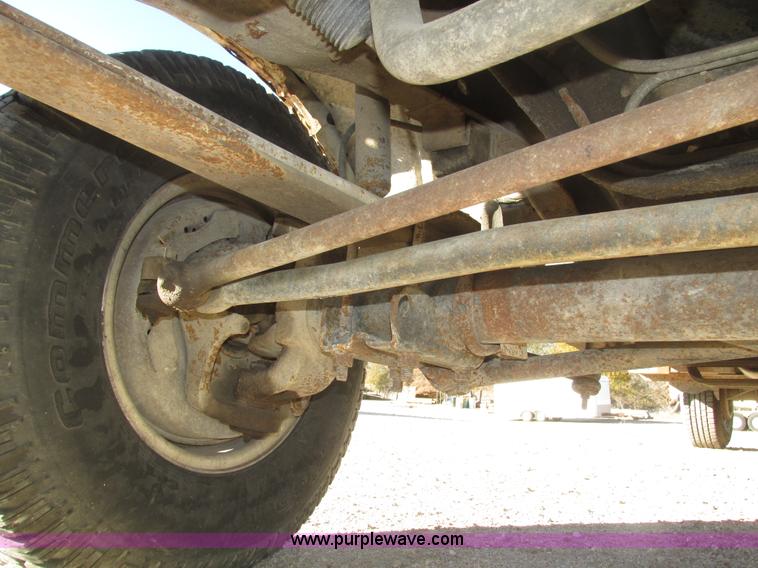 image for item H1032 1996 Ford F350 XLT Crew Cab flat dump bed truck