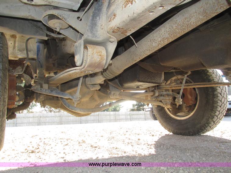 image for item H1032 1996 Ford F350 XLT Crew Cab flat dump bed truck