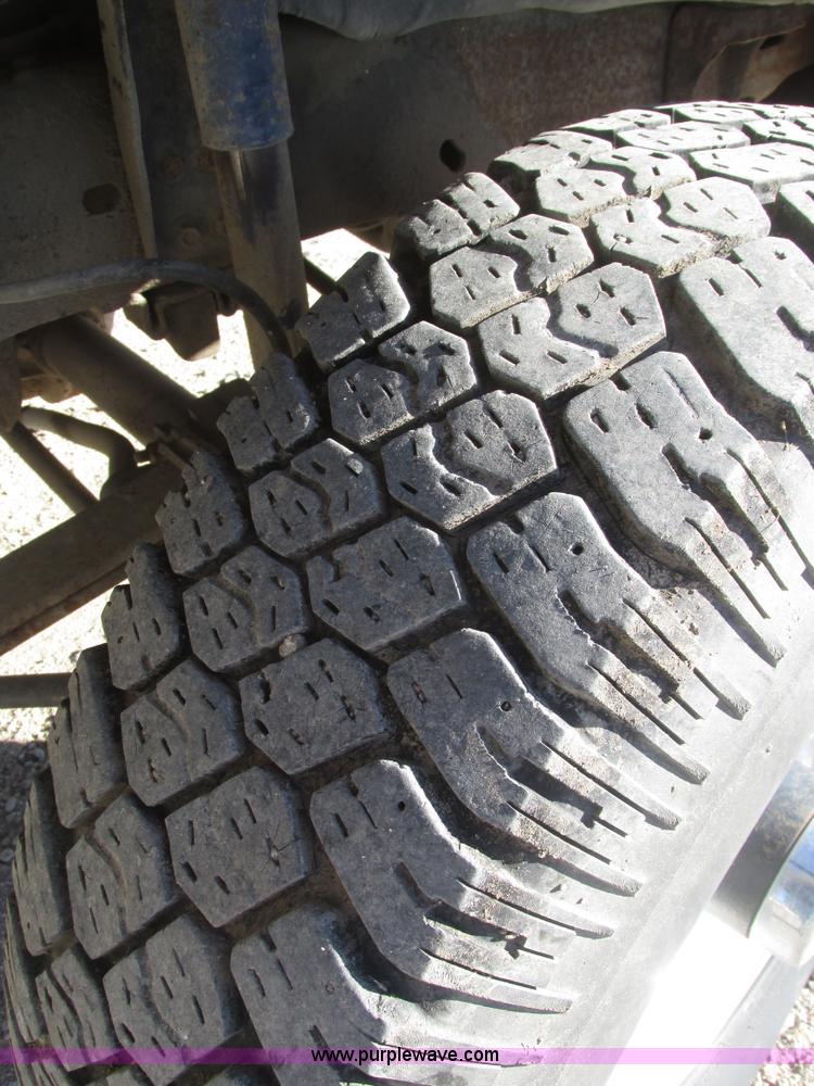 image for item H1032 1996 Ford F350 XLT Crew Cab flat dump bed truck