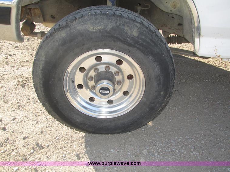 image for item H1032 1996 Ford F350 XLT Crew Cab flat dump bed truck