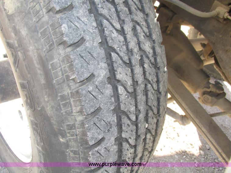 image for item H1032 1996 Ford F350 XLT Crew Cab flat dump bed truck