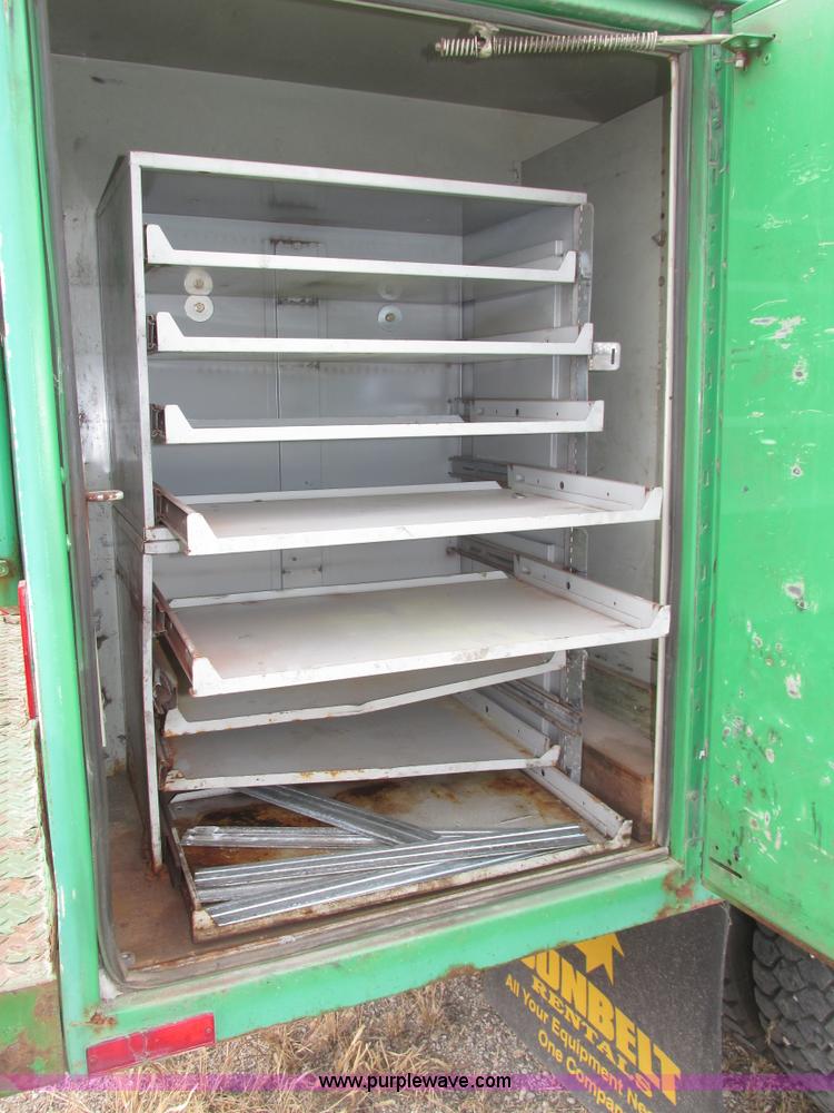 image for item H1049 2005 GMC C4500 Topkick service truck