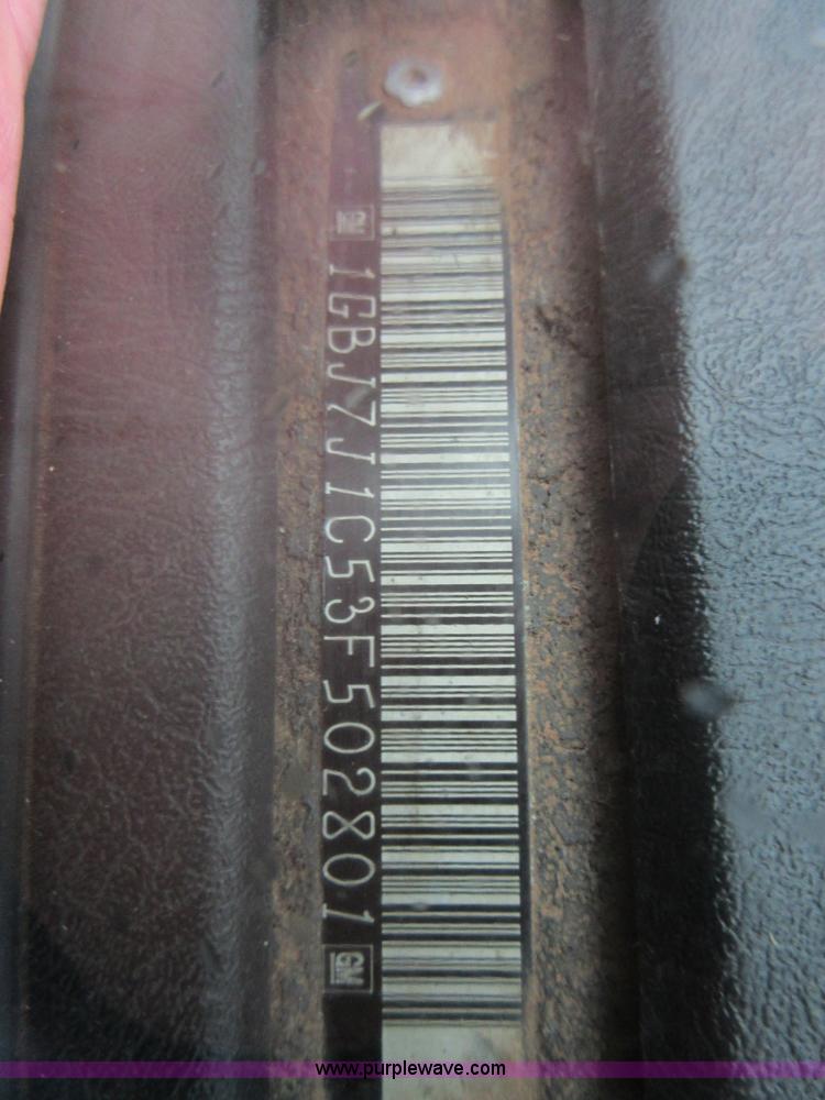 image for item I1850 2003 Chevrolet W7500 dump truck