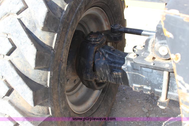 image for item J4262 2008 Caterpillar TL1055 telehandler