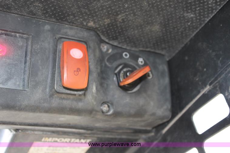 image for item J4578 2012 John Deere 313 skid steer