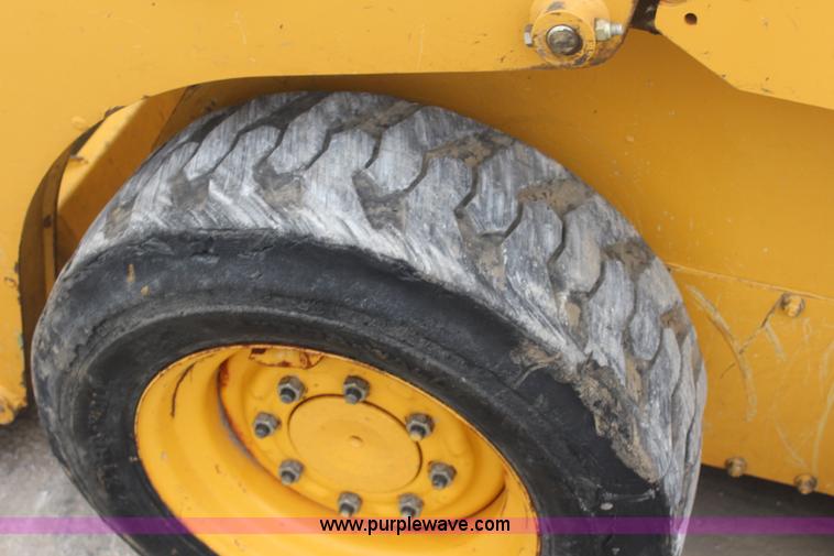 image for item J4578 2012 John Deere 313 skid steer