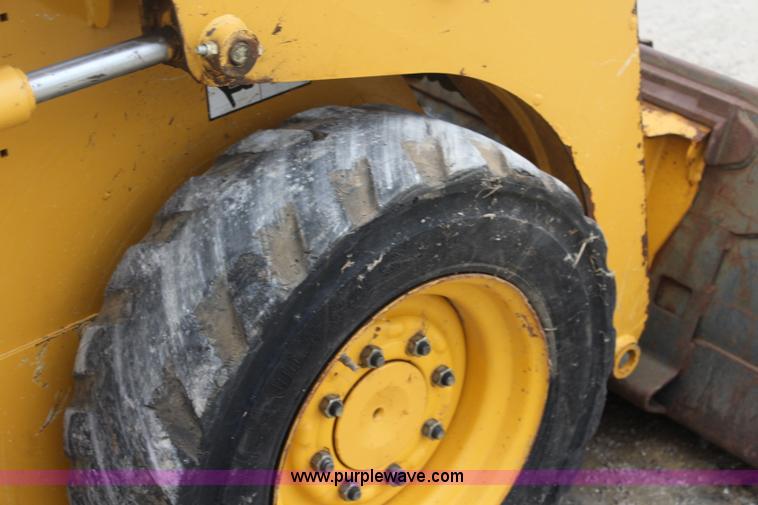 image for item J4578 2012 John Deere 313 skid steer