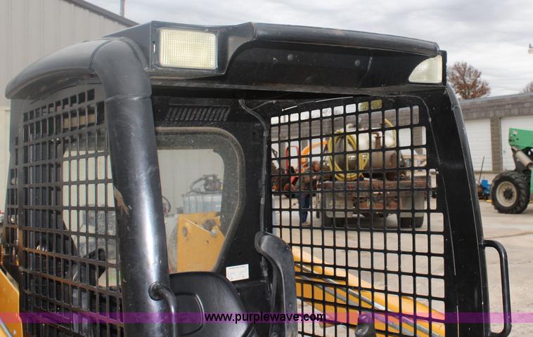 image for item J4578 2012 John Deere 313 skid steer