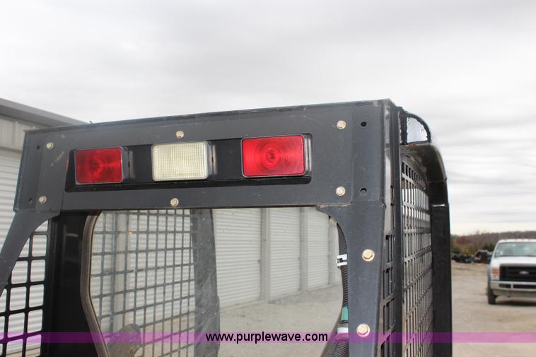 image for item J4578 2012 John Deere 313 skid steer