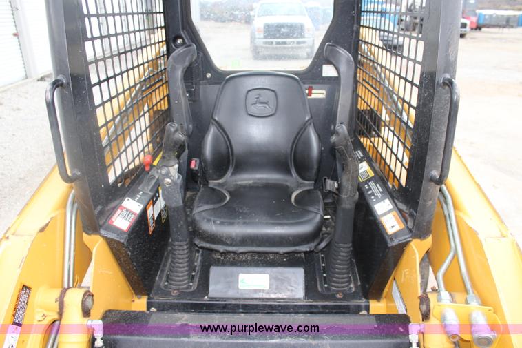 image for item J4579 2011 John Deere 313 skid steer