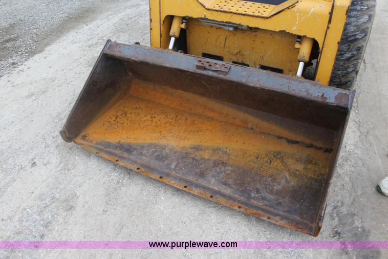 image for item J4579 2011 John Deere 313 skid steer