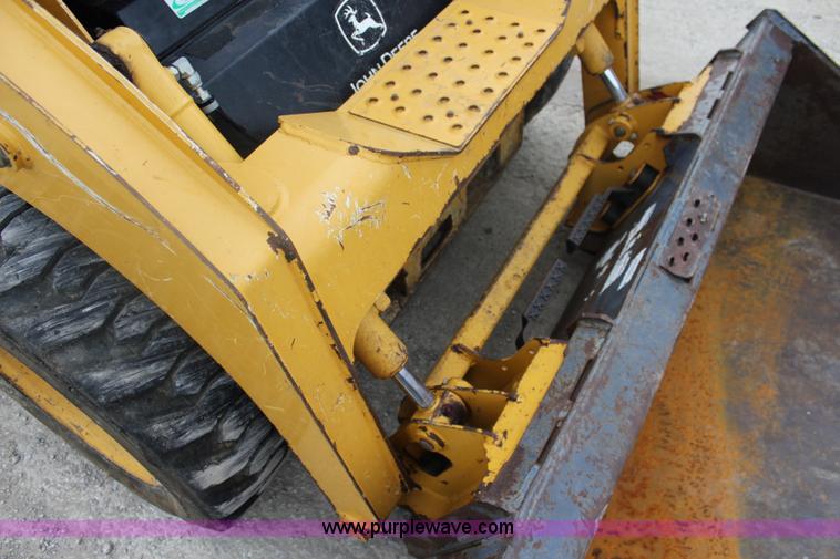 image for item J4579 2011 John Deere 313 skid steer