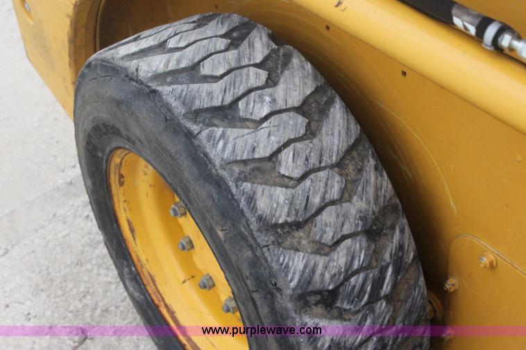 image for item J4579 2011 John Deere 313 skid steer