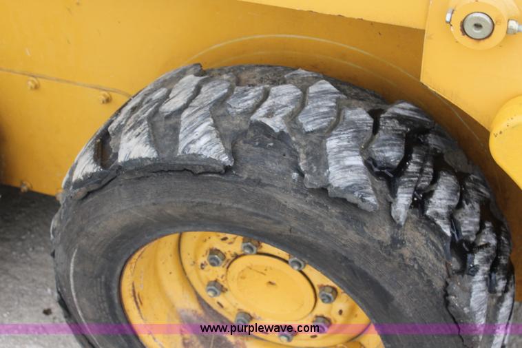 image for item J4579 2011 John Deere 313 skid steer