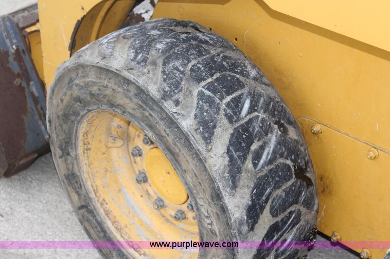 image for item J4579 2011 John Deere 313 skid steer