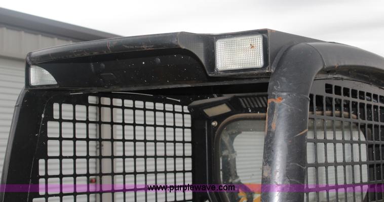 image for item J4579 2011 John Deere 313 skid steer