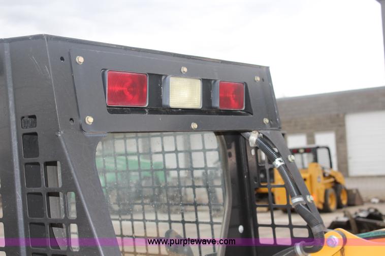 image for item J4579 2011 John Deere 313 skid steer