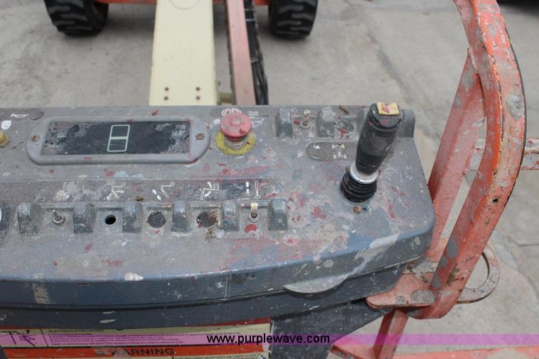 image for item J4580 1999 JLG 600S boom lift