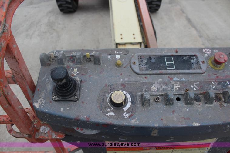 image for item J4580 1999 JLG 600S boom lift