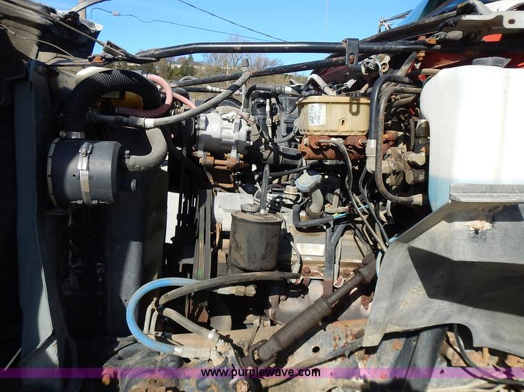 image for item J6343 1995 Ford F750 dump truck with scissor lift bed