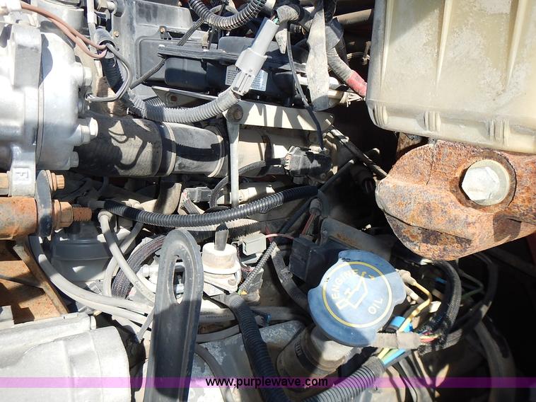 image for item J6343 1995 Ford F750 dump truck with scissor lift bed