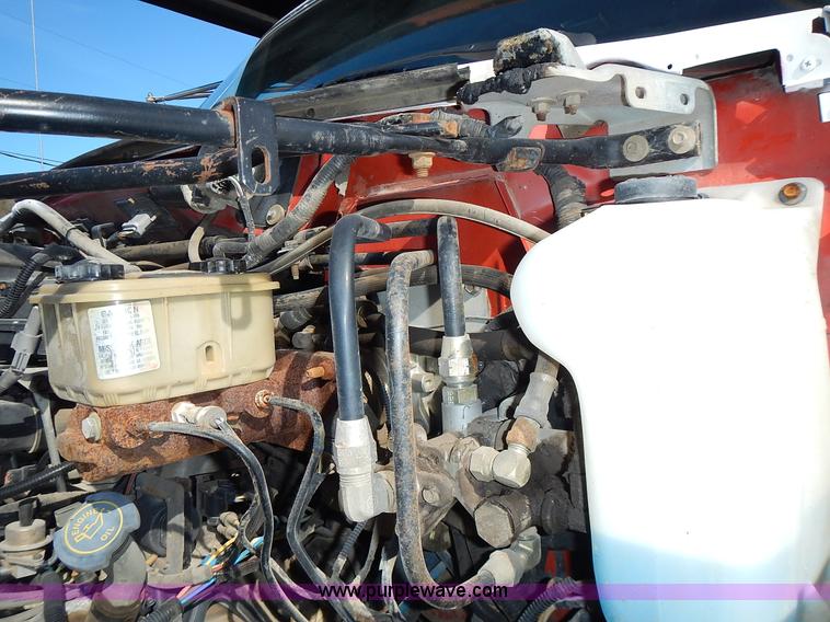 image for item J6343 1995 Ford F750 dump truck with scissor lift bed