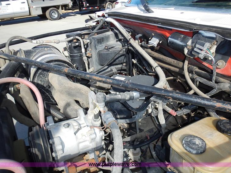 image for item J6343 1995 Ford F750 dump truck with scissor lift bed