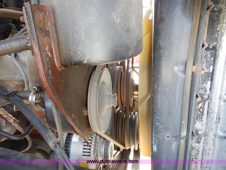 image for item J6343 1995 Ford F750 dump truck with scissor lift bed