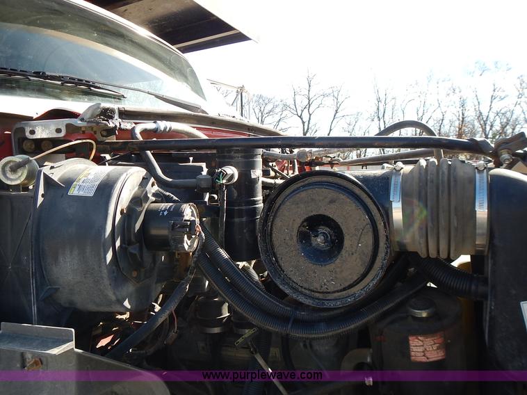 image for item J6343 1995 Ford F750 dump truck with scissor lift bed