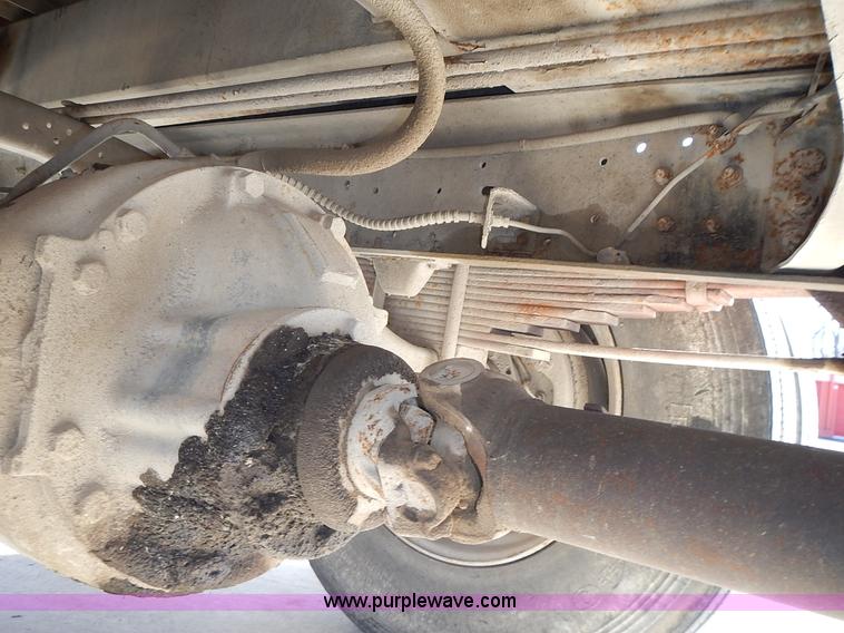 image for item J6343 1995 Ford F750 dump truck with scissor lift bed