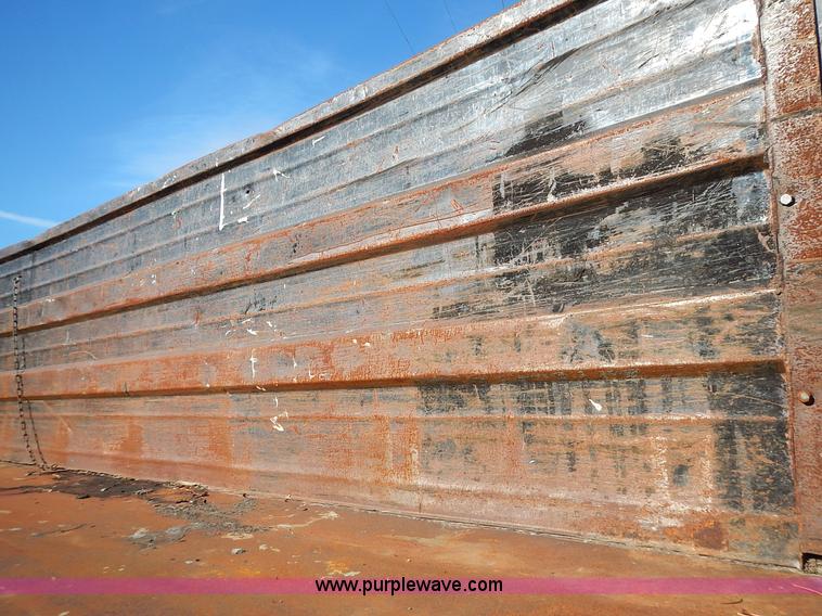 image for item J6343 1995 Ford F750 dump truck with scissor lift bed