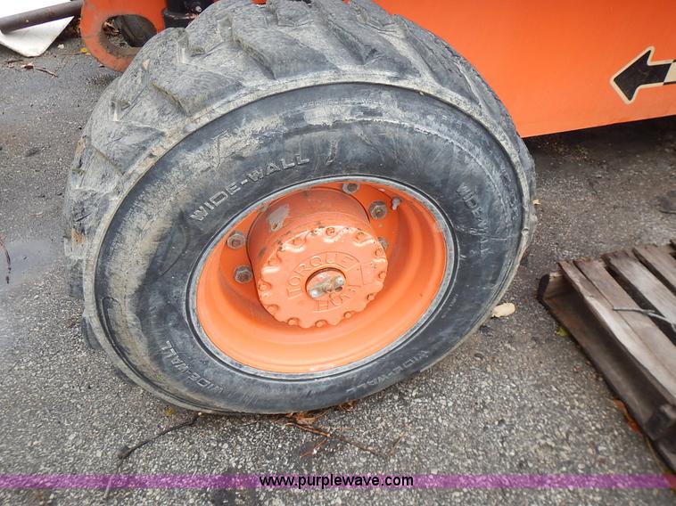 image for item J6345 1999 JLG 80HX boom lift