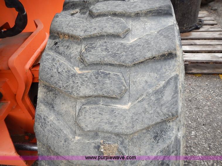 image for item J6345 1999 JLG 80HX boom lift