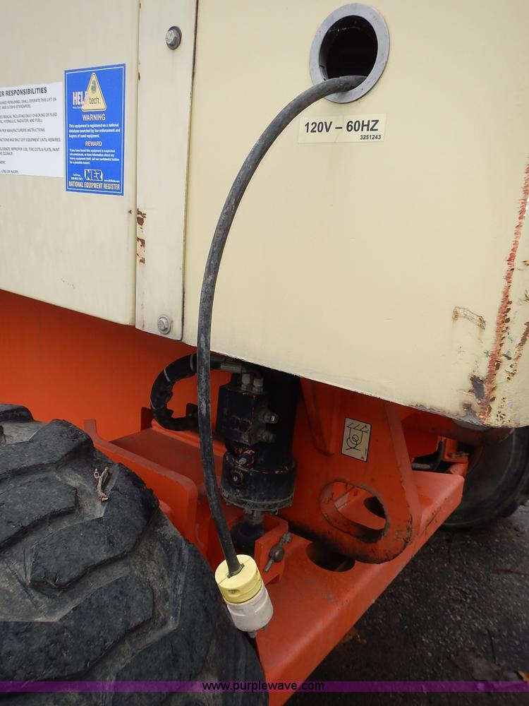 image for item J6345 1999 JLG 80HX boom lift