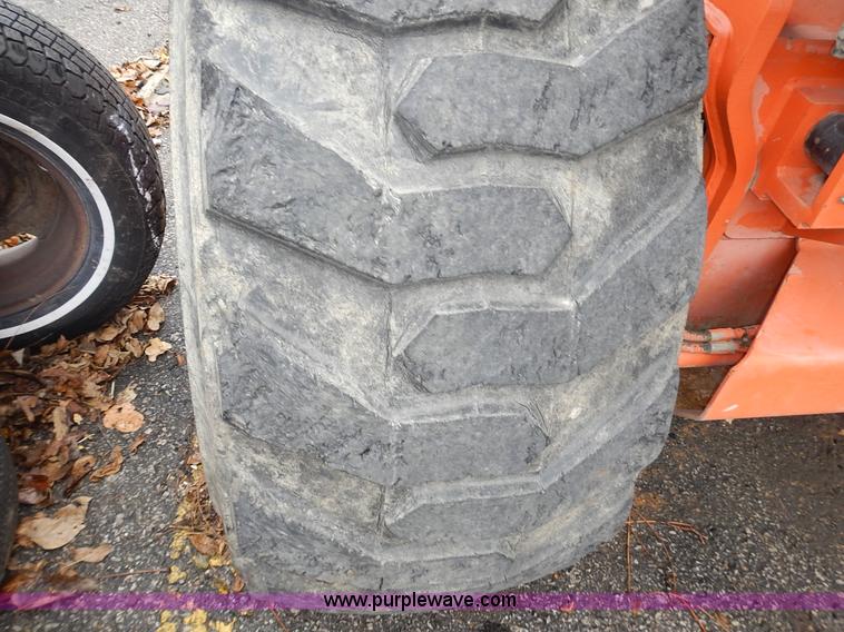 image for item J6345 1999 JLG 80HX boom lift